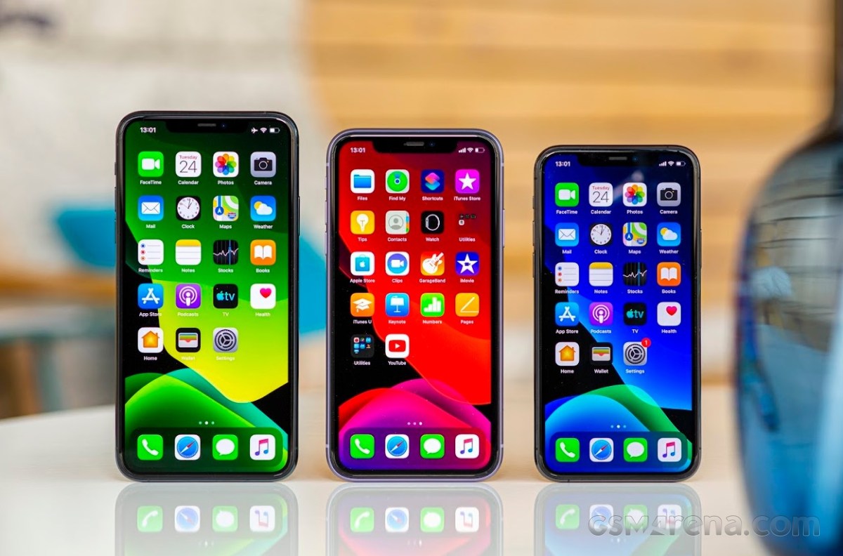Multiple iPhones displayed on a table illustrating the usbliter8 vulnerability